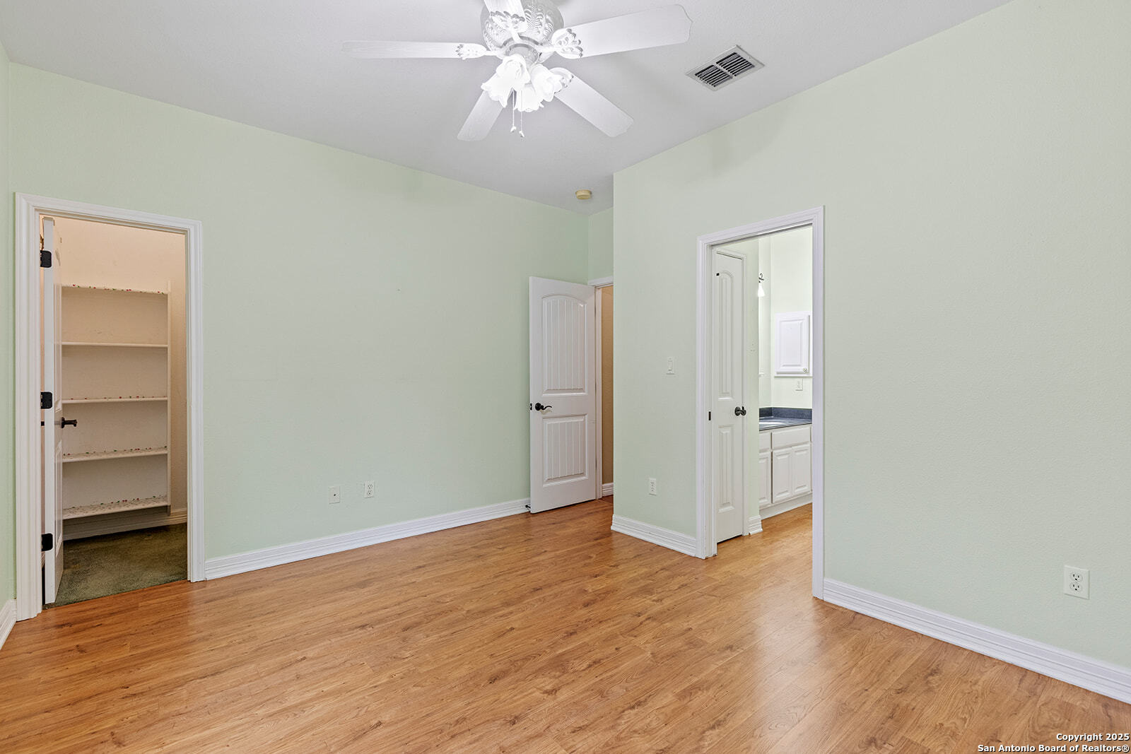 632 Copper Rim Spring Branch, TX 78070 - Photo 33 of 45 an empty room with wooden floor and ceiling fan