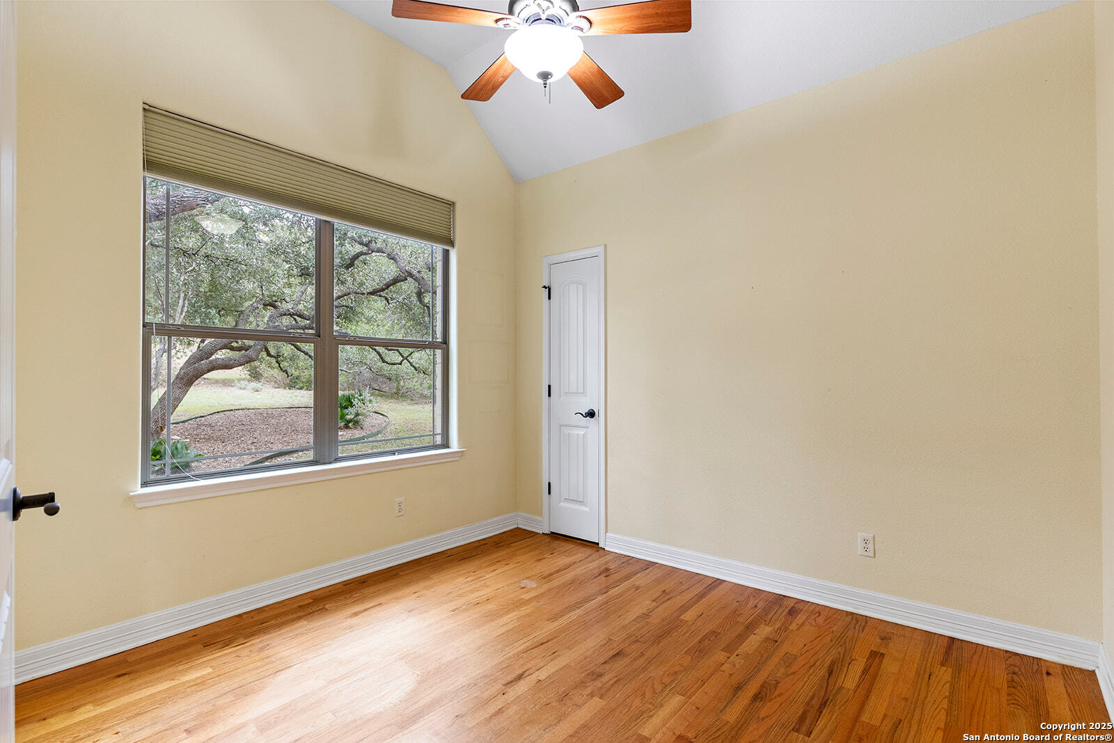 632 Copper Rim Spring Branch, TX 78070 - Photo 35 of 45 wooden floor in an empty room with a window