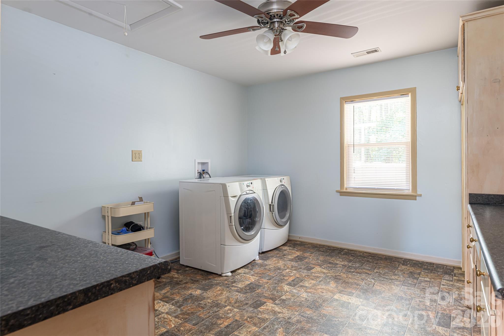2800 Coxe Road Tryon, NC 28782 - Photo 32 of 40 a utility room with a window dryer and washer