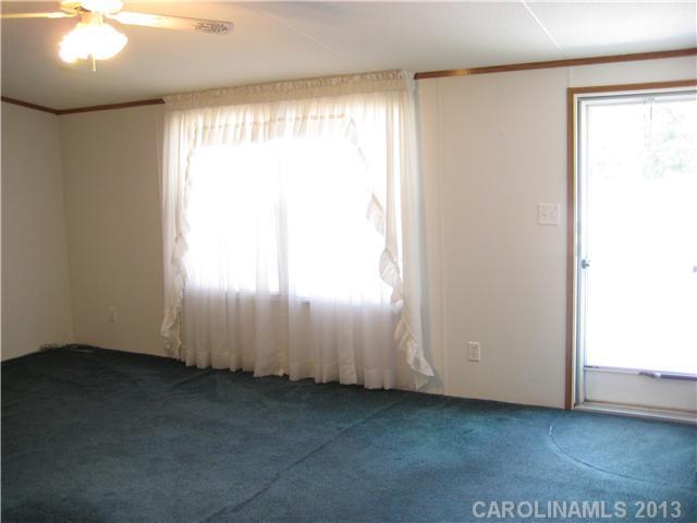 3915 Berry Hill Road Edgemoor, SC 29712 - Photo 4 of 16 an empty room with a window