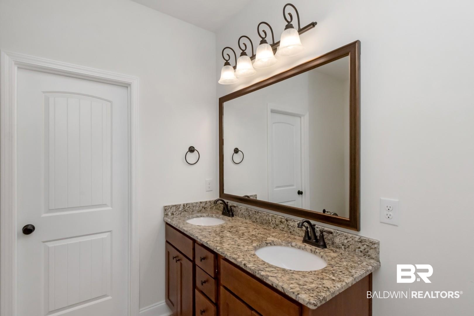 10714 Brodick Loop Spanish Fort, AL 36527 - Photo 17 of 26 Bathroom featuring double vanity