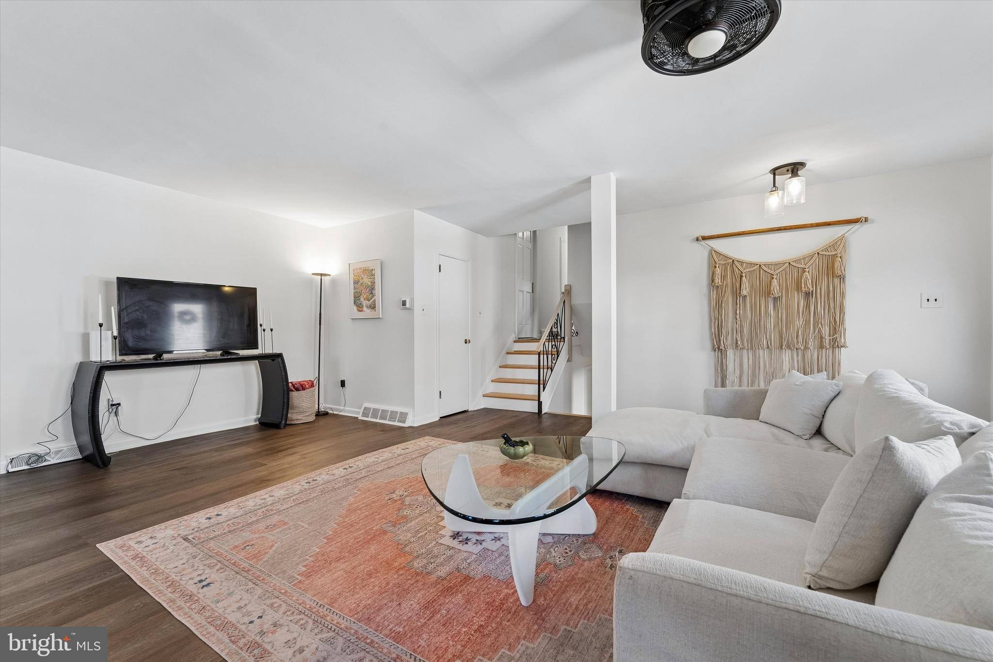 19 Juniper Road Havertown, PA 19083 - Photo 6 of 24 a living room with furniture and a flat screen tv