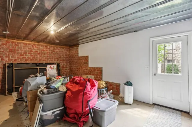 a view of balcony with furniture