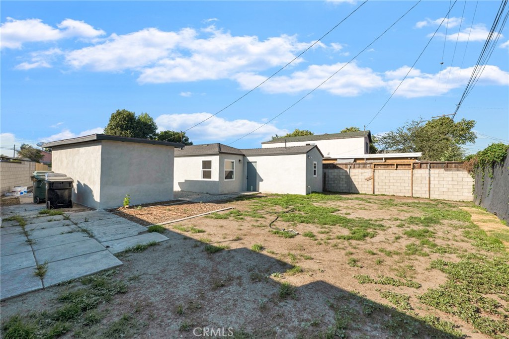 2124 East Oris Street Compton, CA 90222 - Photo 15 of 20 a view of backyard of house and outdoor seating