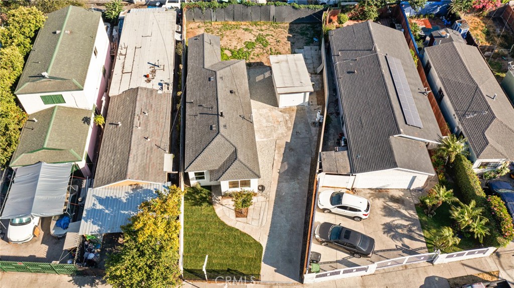 2124 East Oris Street Compton, CA 90222 - Photo 19 of 20 an aerial view of residential houses with outdoor space