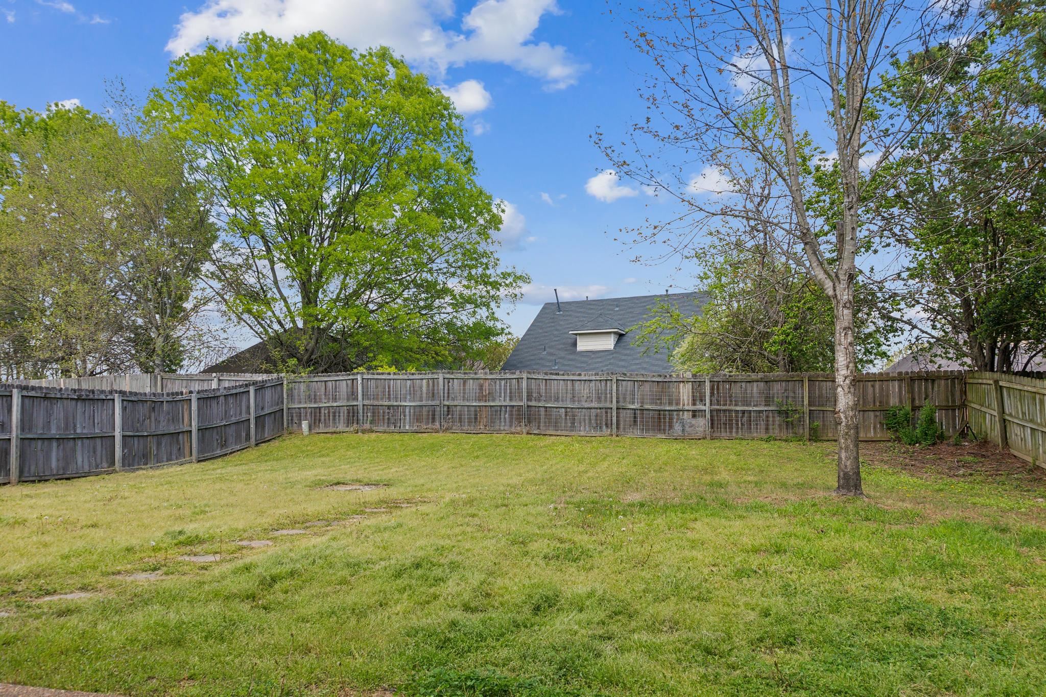 5368 Milton Ridge Drive Arlington, TN 38002 - Photo 15 of 15 View of yard featuring a fenced backyard