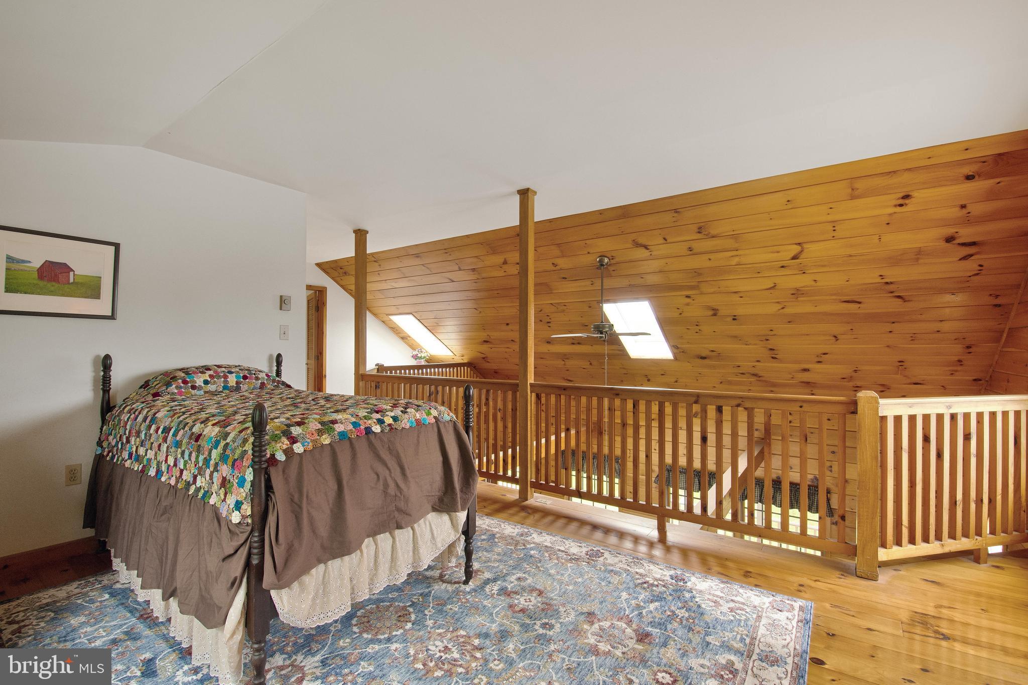 968 Main Street Deale, MD 20751 - Photo 19 of 26 Loft bedroom area overlooking living room