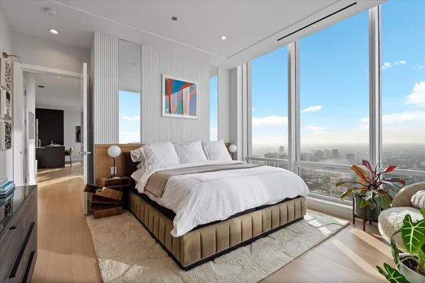 a bed room with a bed and a couch