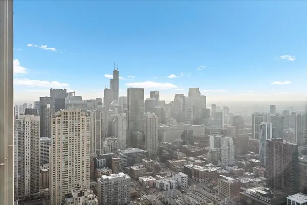 a view of a city with tall buildings