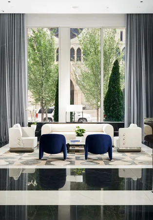 a view of a swimming pool with chairs