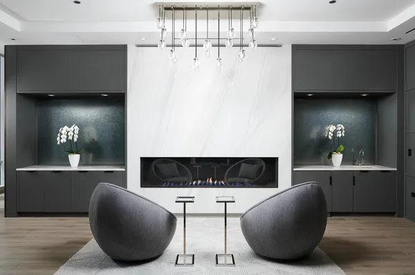 a outdoor living room with patio furniture and a potted plant