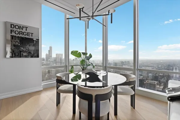 a dining room with furniture and window