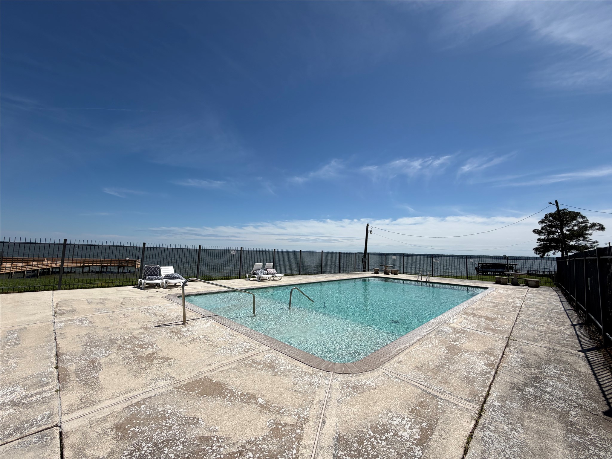 30 North Terrace Drive Point Blank, TX 77364 - Photo 12 of 14 a view of a swimming pool with a lounge chair