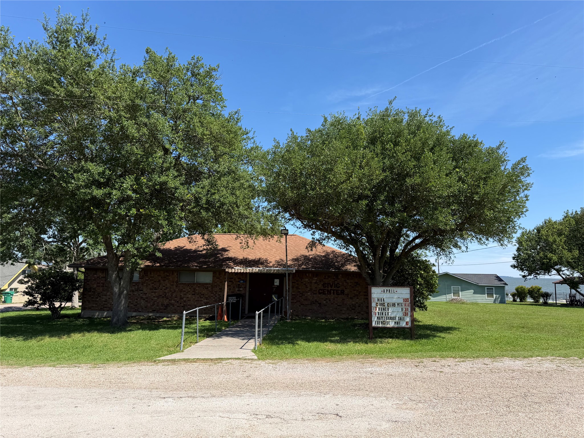 30 North Terrace Drive Point Blank, TX 77364 - Photo 14 of 14 a tree in front of a house with a garden