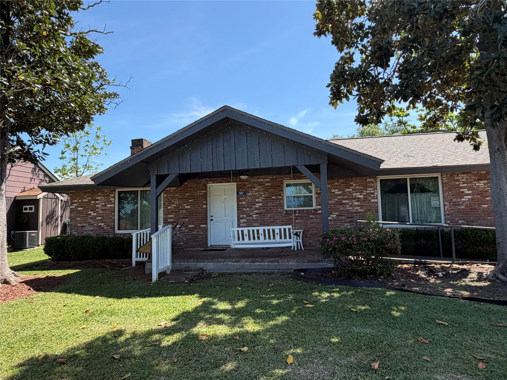 30 North Terrace Drive Point Blank, TX 77364 - Photo 2 of 14 a front view of a house with garden