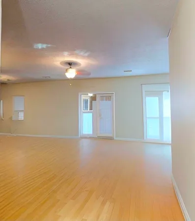 a view of an empty room with window