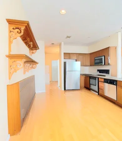 a view of a living room and dining room