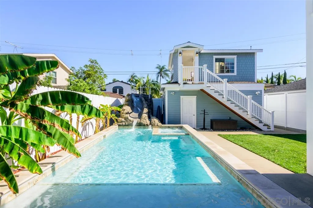 261 E Avenue Coronado, CA 92118 - Photo 21 of 25 a view of house with swimming pool outdoor seating
