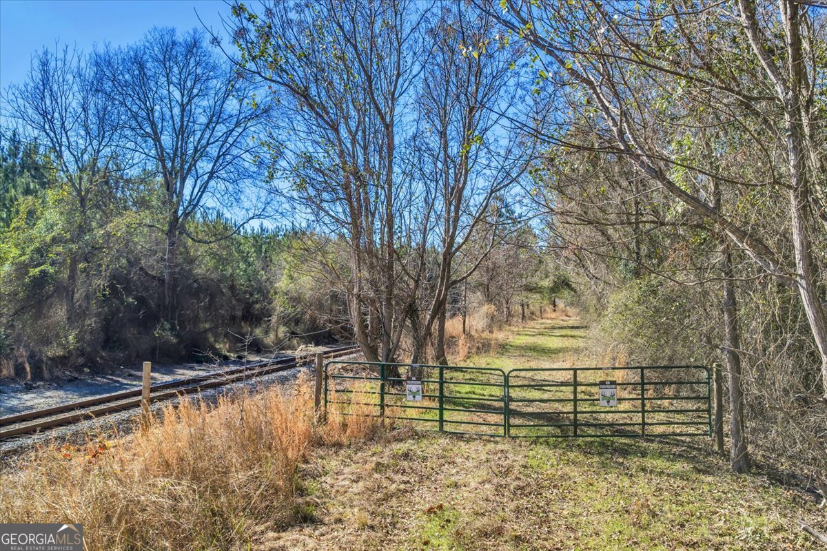 296 Boxwood Road Fort Valley, GA 31030 - Photo 34 of 52 a view of swimming pool with an outdoor seating
