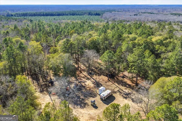 a view of a playground with a house