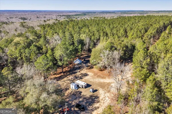 a view of backyard with green space
