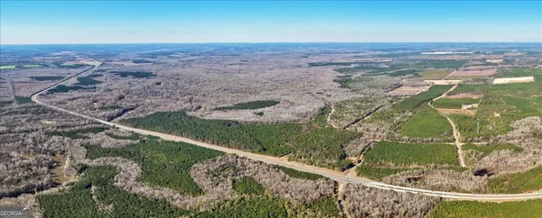 a view of a yard with an outdoor space