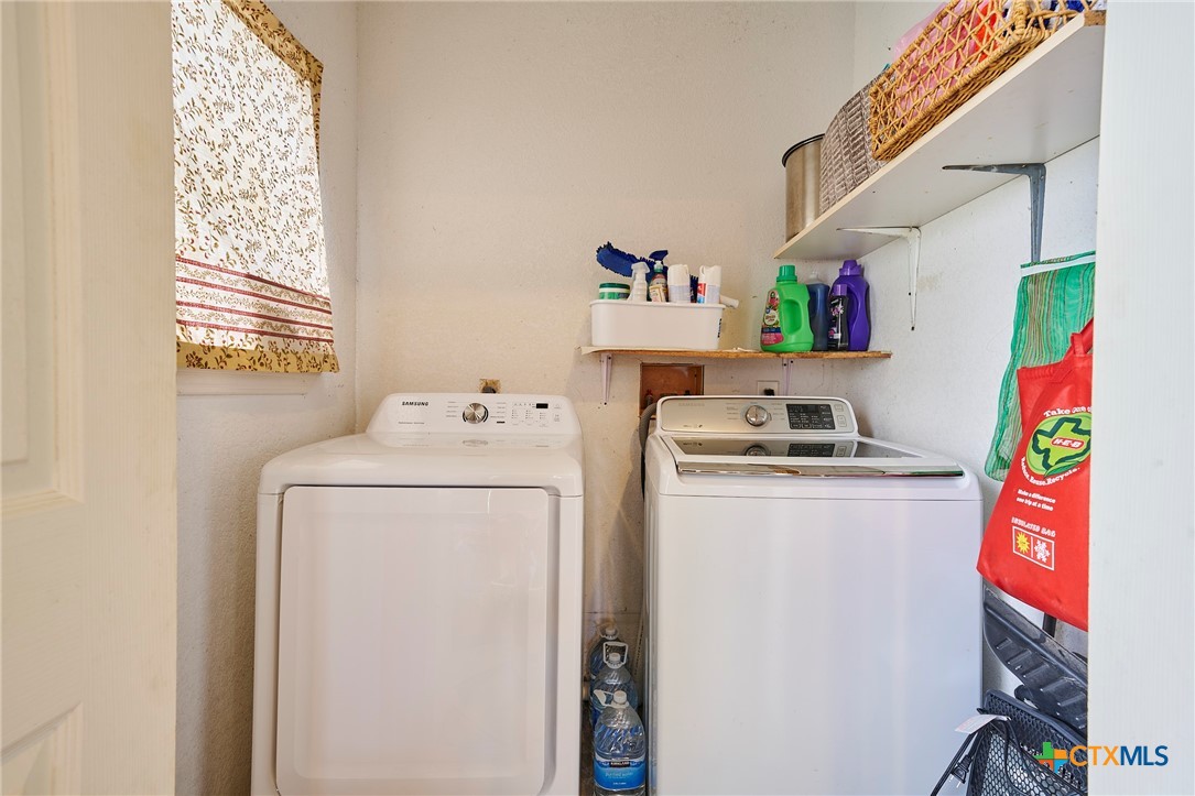 1085 Garrett Trail Maxwell, TX 78656 - Photo 14 of 40 a utility room with dryer and washer