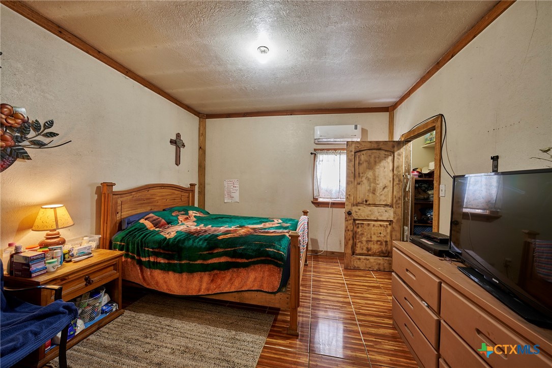 1085 Garrett Trail Maxwell, TX 78656 - Photo 26 of 40 a room with storage and utility