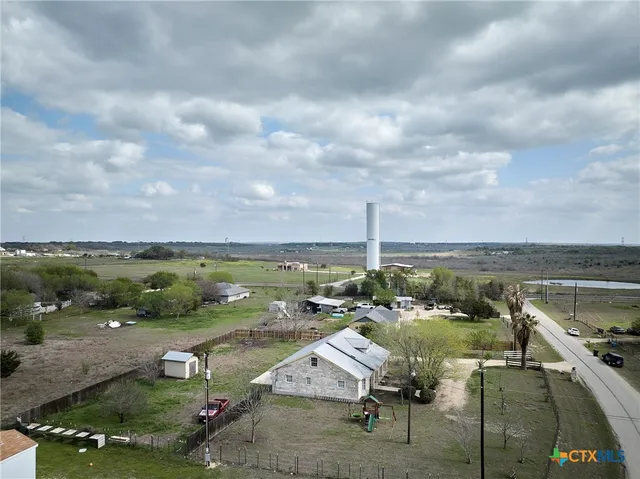 a view of a lake with a city