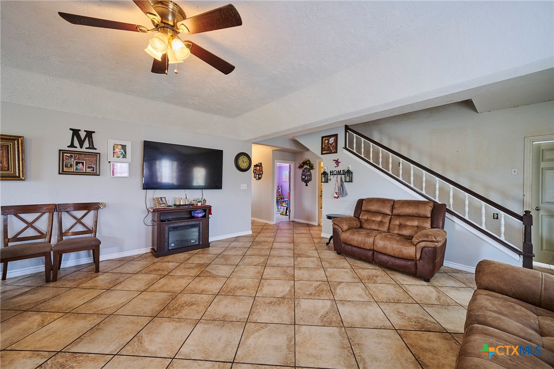 1085 Garrett Trail Maxwell, TX 78656 - Photo 10 of 40 a living room with furniture and a flat screen tv