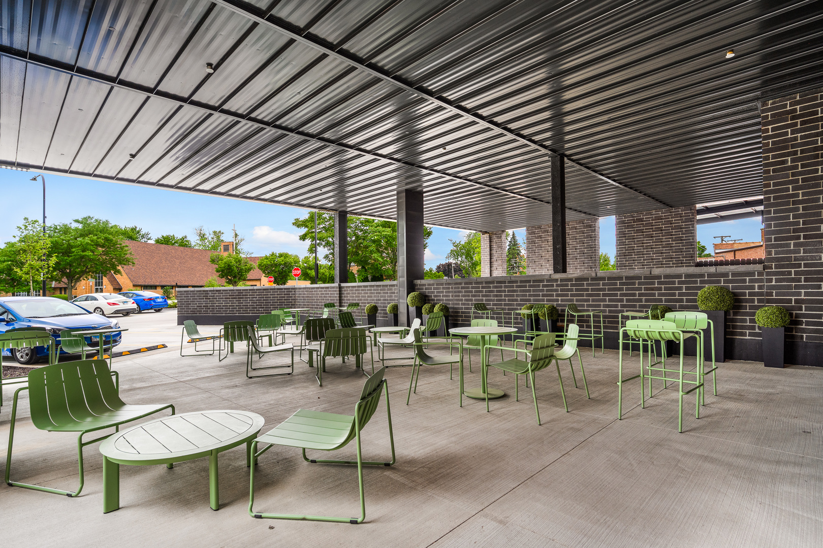 11 West Prospect Avenue, Unit 417 Mount Prospect, IL 60056 - Photo 66 of 66 a view of a patio with a table and chairs under an umbrella