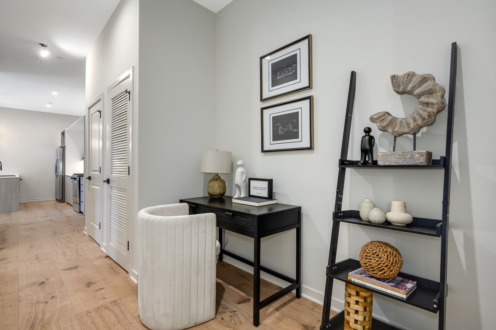 11 West Prospect Avenue, Unit 417 Mount Prospect, IL 60056 - Photo 10 of 66 a view of a workspace with furniture and wooden floor