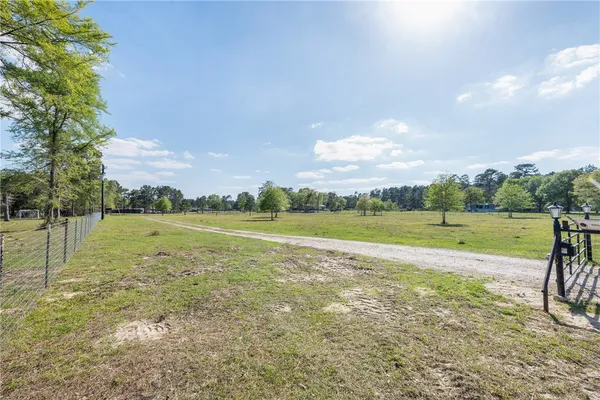 a view of a lake with a big yard