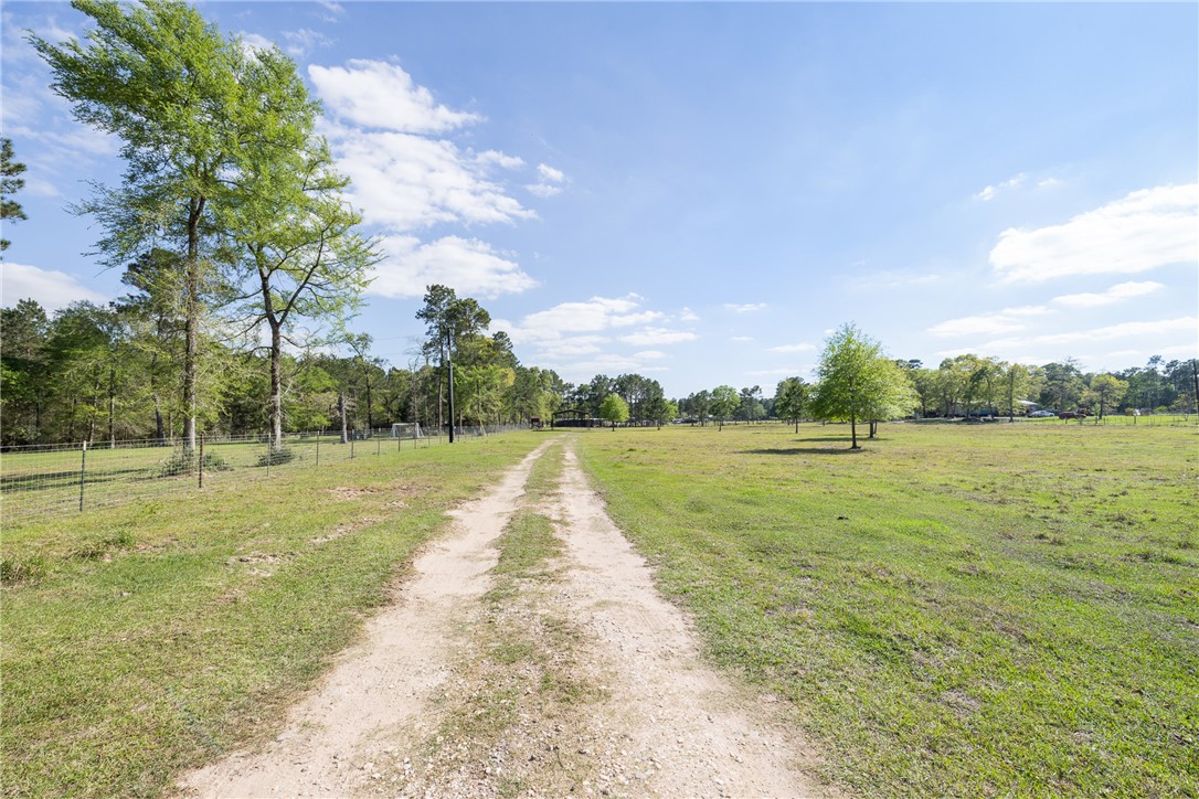 5890 Magan Road Navasota, TX 77868 - Photo 2 of 33 a view of lake with green space