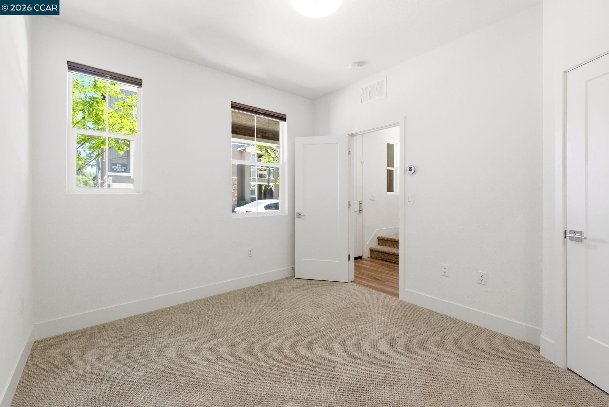 205 Plum Tree Street Livermore, CA 94551 - Photo 43 of 47 an empty room with windows and closet