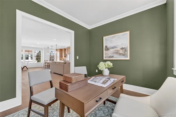 a living room with a couch and a table