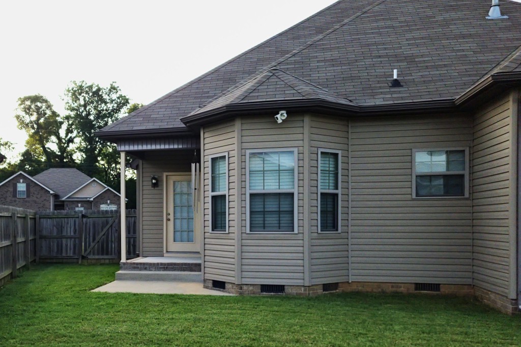 1077 Golf View Way Spring Hill, TN 37174 - Photo 32 of 32 a front view of a house with a garden