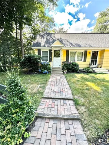 a front view of house with yard