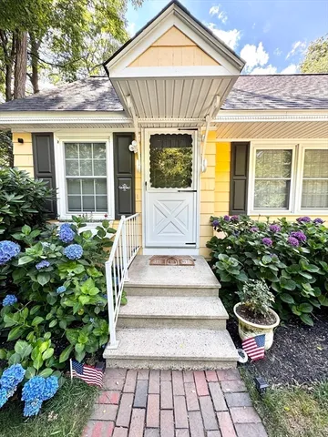 a front view of a house with a porch
