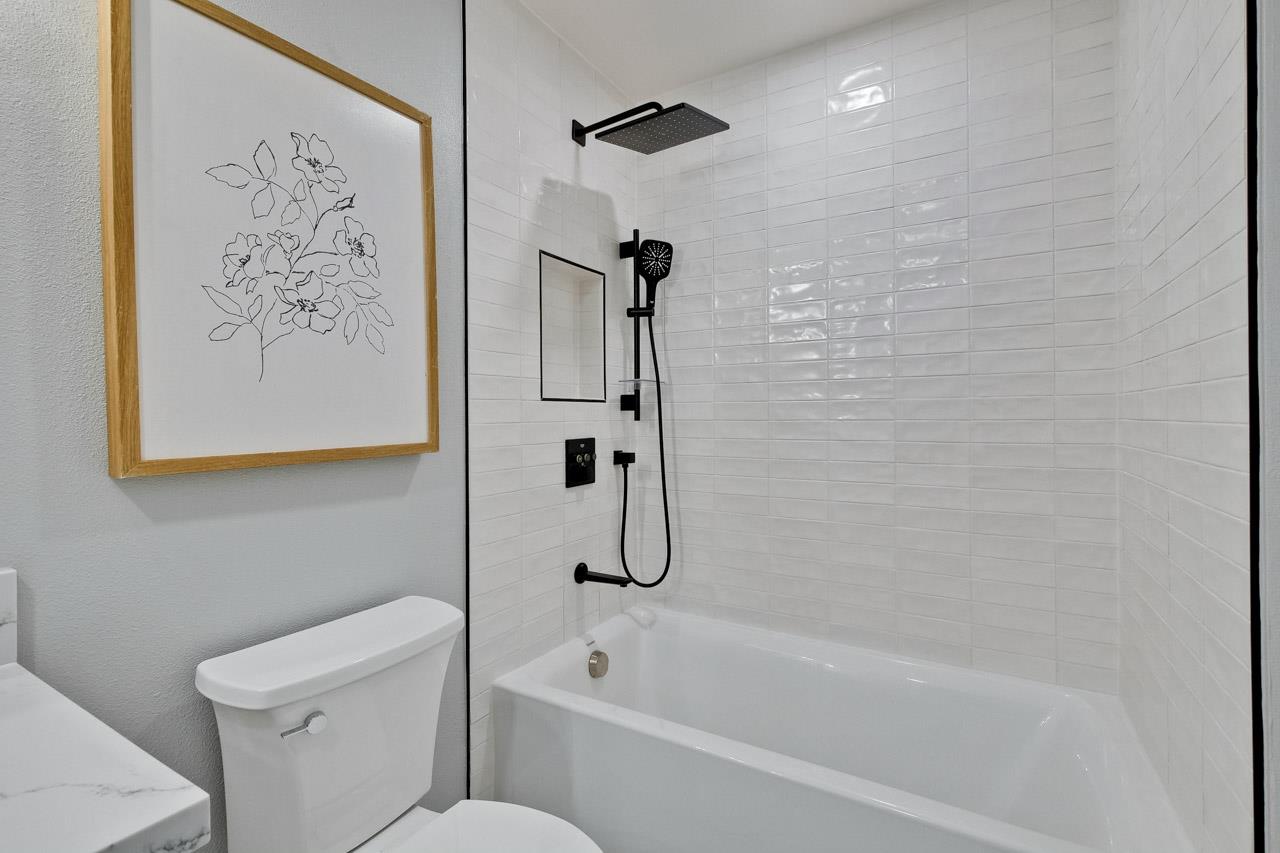 10993 Northsky Square Cupertino, CA 95014 - Photo 33 of 48 a bathroom with a bathtub and a toilet