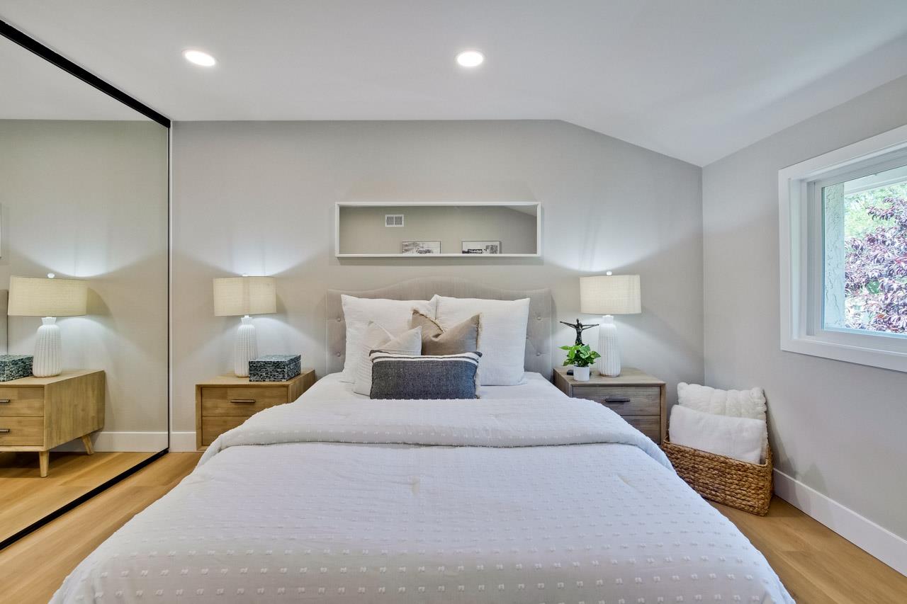 10993 Northsky Square Cupertino, CA 95014 - Photo 35 of 48 a bedroom with a bed and a night stand