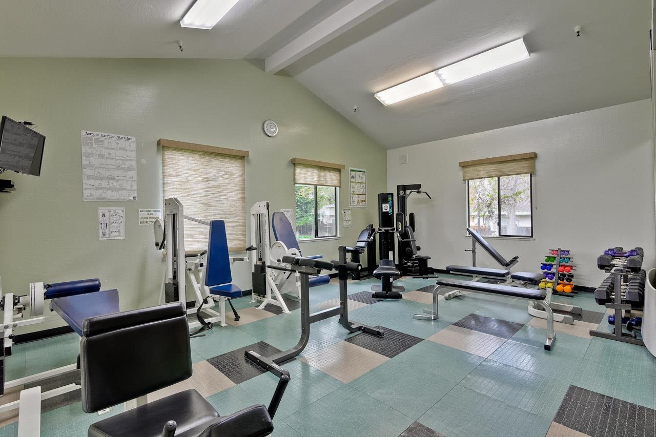 10993 Northsky Square Cupertino, CA 95014 - Photo 46 of 48 a view of a livingroom with furniture and windows