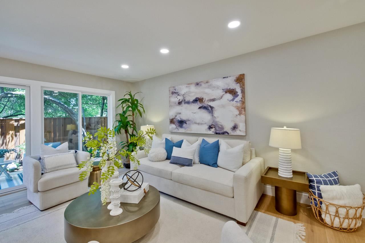 10993 Northsky Square Cupertino, CA 95014 - Photo 7 of 48 a living room with furniture and a potted plant