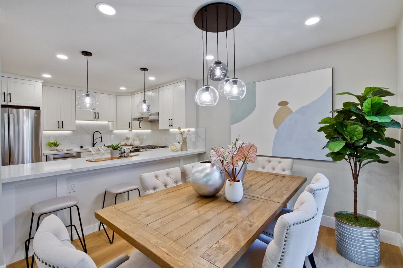 10993 Northsky Square Cupertino, CA 95014 - Photo 9 of 48 a view of a dining room with furniture and chandelier