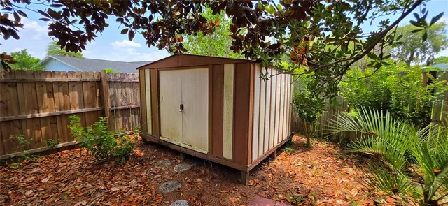 a house view with a backyard space