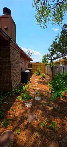 a backyard of a house with lots of green space