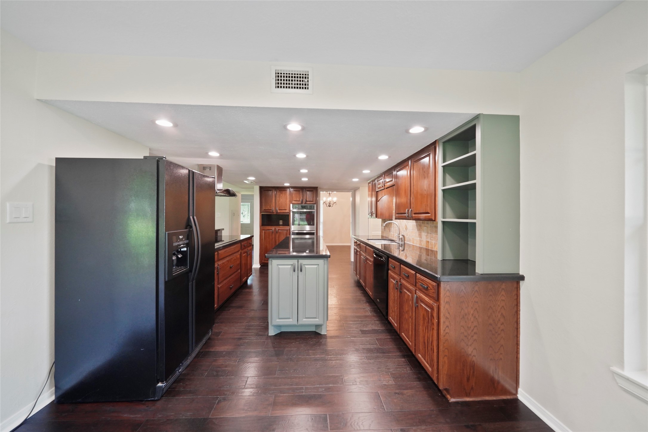 14443 Lyric Road Conroe, TX 77302 - Photo 9 of 49 Kitchen, refrigerator is included in the sale
