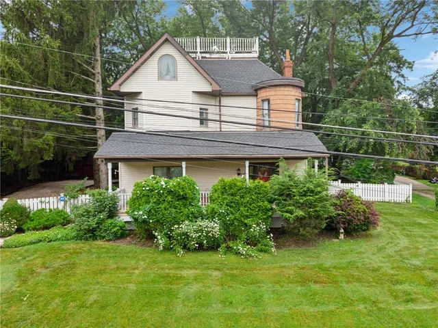 a house view with a garden space