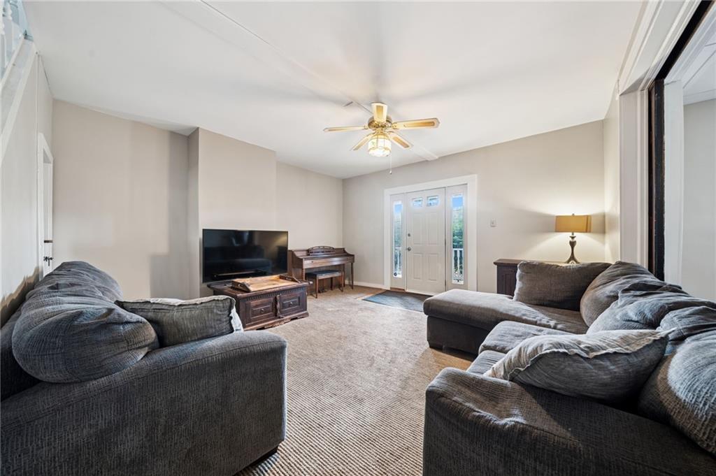 1035 Linden Road Eighty Four, PA 15330 - Photo 12 of 29 a living room with furniture and a flat screen tv