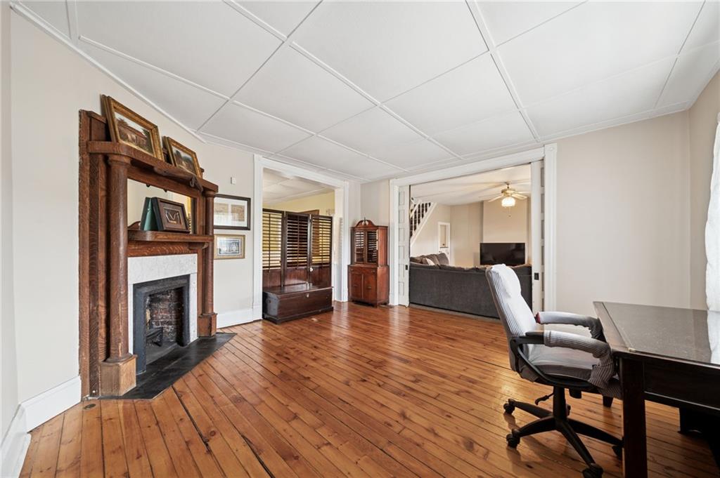 1035 Linden Road Eighty Four, PA 15330 - Photo 17 of 29 a living room with fireplace furniture and a wooden floor